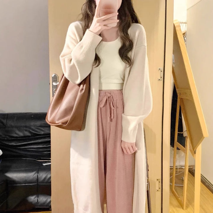 Manteau long en tricot pour femmes en matériau de haute qualité avec poches pratiques Chic & Stil