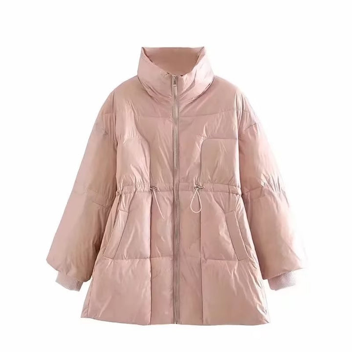 Quilted transition jacket for women with high collar and practical side pockets Lune London