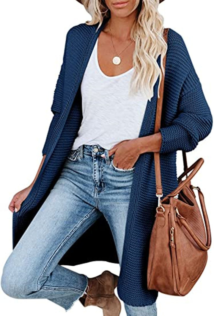Ladies chunky knit cardigan with front openings and practical pockets Lune London