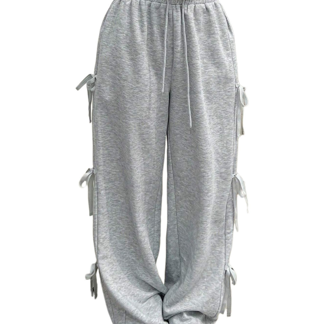 Pantalon de loisirs pour femmes avec des détails volant sur les côtés et une taille élastique Chic & Stil