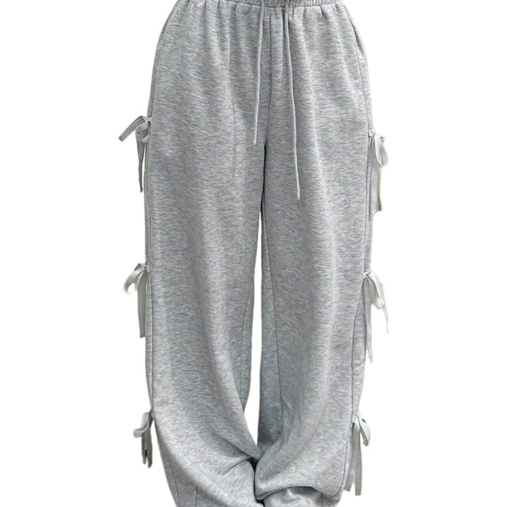 Pantalon de loisirs pour femmes avec des détails volant sur les côtés et une taille élastique Chic & Stil