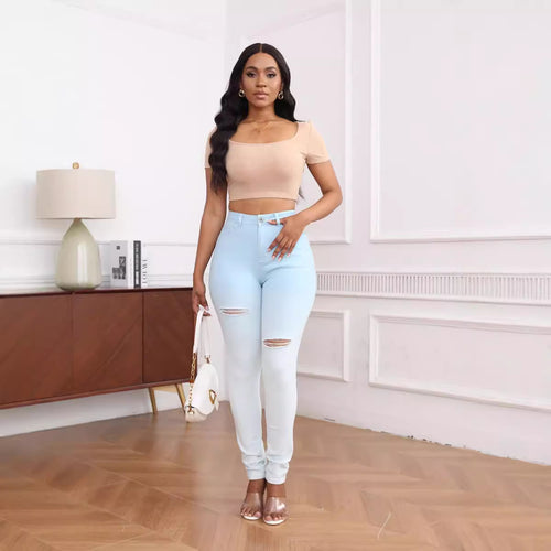 High-waisted women's fitted jeans with stylish ripped details Amarae