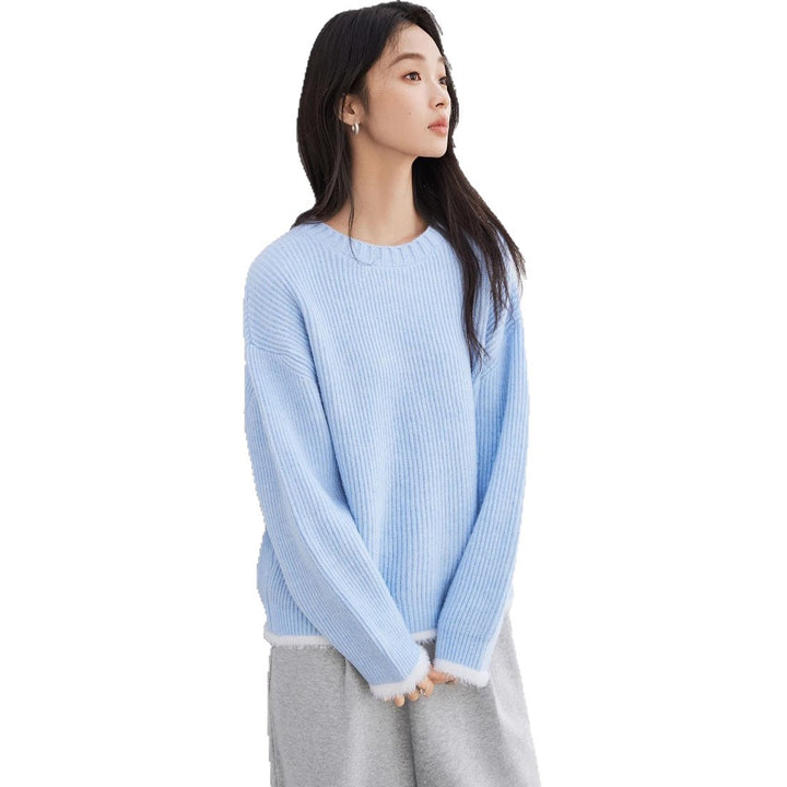 Pull moelleux pour femmes avec une coupe décontractée et des détails modernes en côte Chic & Stil
