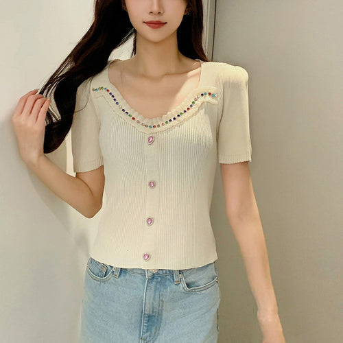 Women's fitted top with decorative button placket and fashionable V-neck