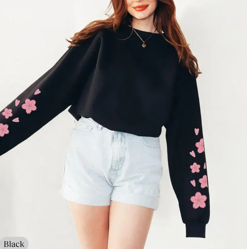 Sweatshirt pour femmes avec design floral et manches amples Chic & Stil