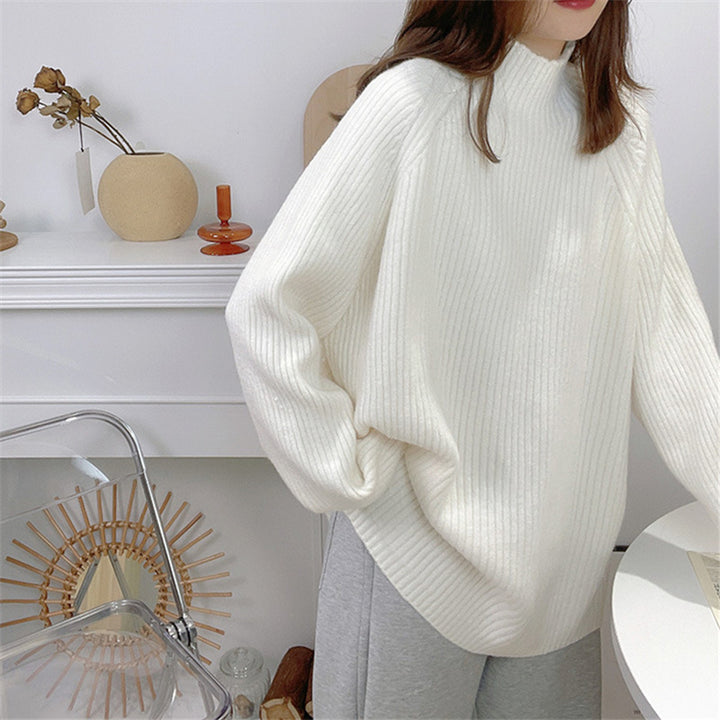 Oversized knitted sweater for women with high collar and fine ribbed structure Lune London
