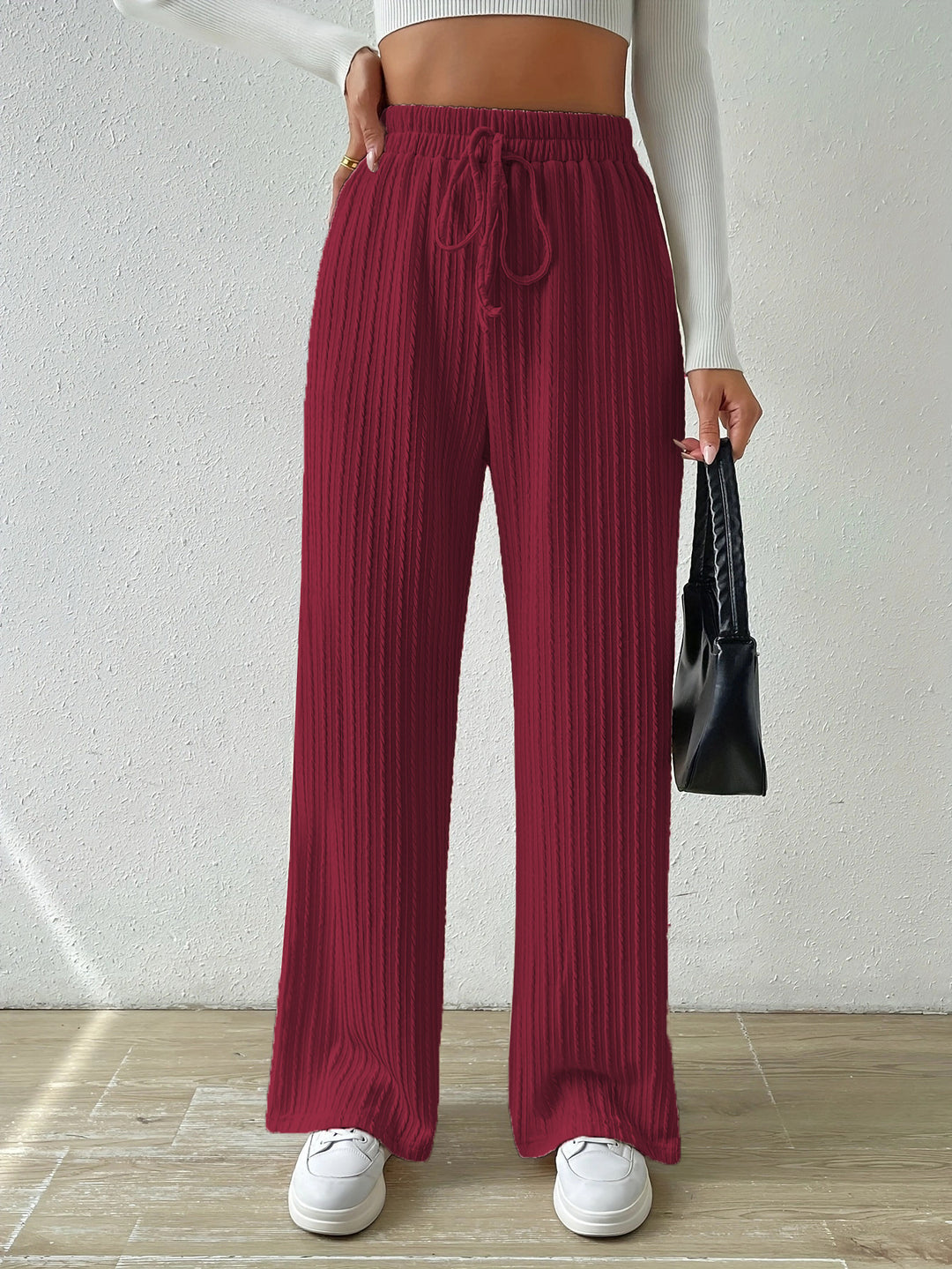 Loose knit pants for women with elastic waistband and trendy longitudinal structure Lune London