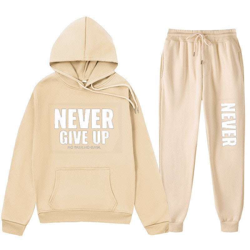Women's training pullover and jogging pants in motif set with motivating print Chic & Stil