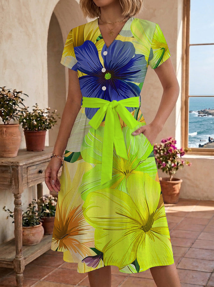 Women’s midi dress with colorful floral design and adjustable tie belt Lune London