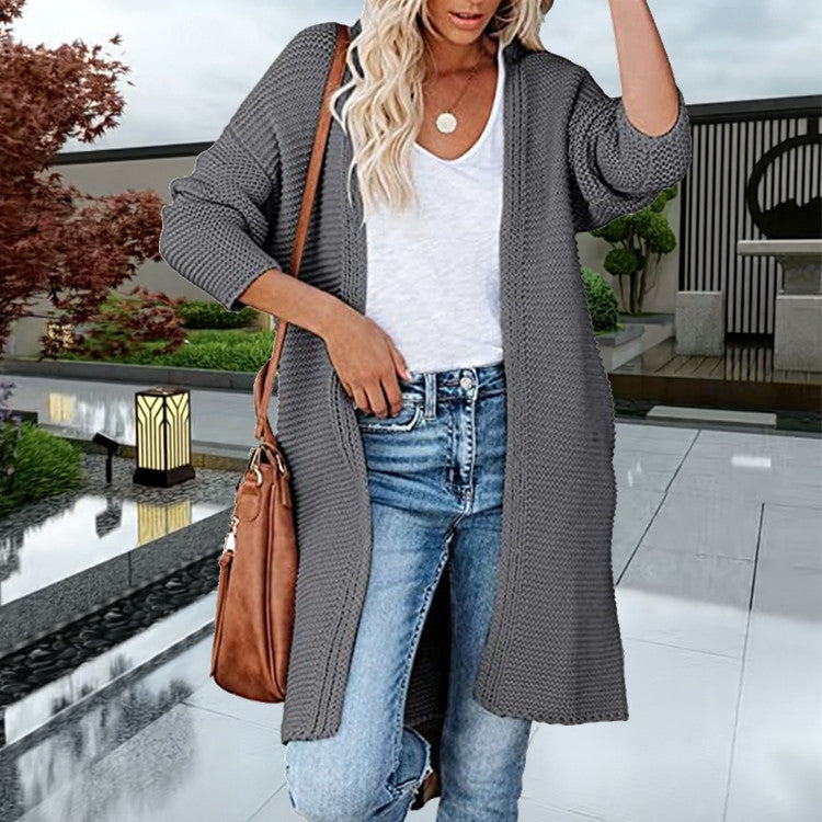 Ladies chunky knit cardigan with front openings and practical pockets Lune London