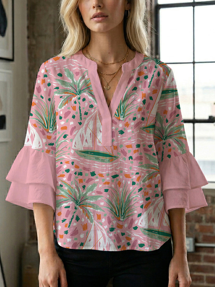Women's blouse with ruffle details and eye-catching animal print Lune London