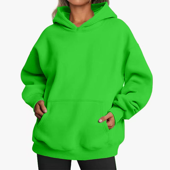 Women's oversized hoodie with practical kangaroo pockets and soft inner lining Chic & Stil