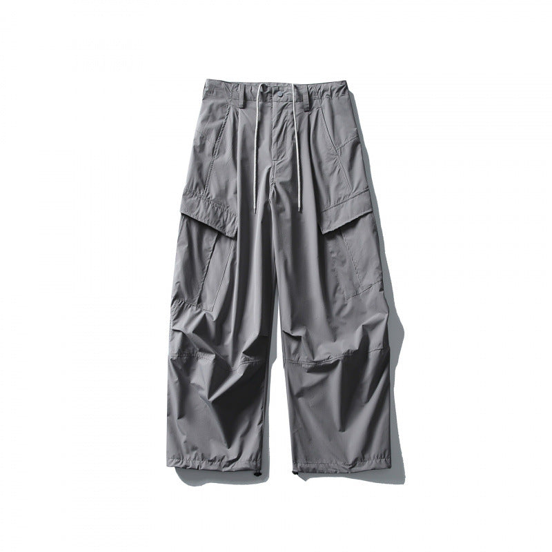 Men's loose technical cargo pants with drawstring waistband and adjustable leg closures Amarae