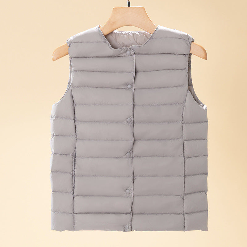 Women's sleeveless quilted thermal vest with round neck and snap button placket Amarae