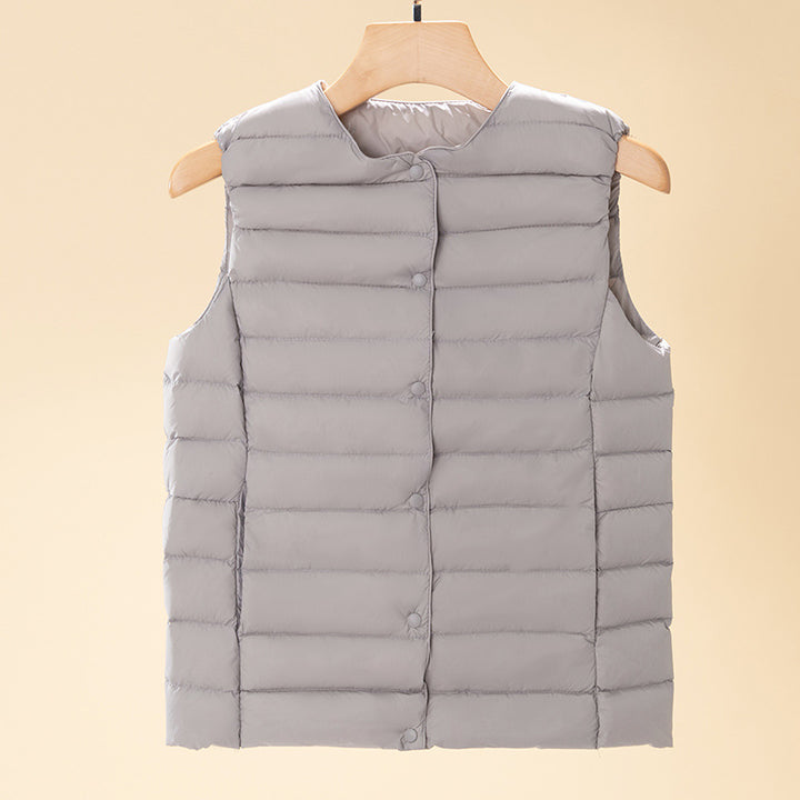 Women's sleeveless quilted thermal vest with round neck and snap button placket Amarae