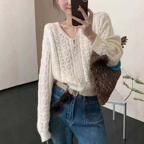 Women's knitted jacket with a delicate lace pattern and button details Amarae