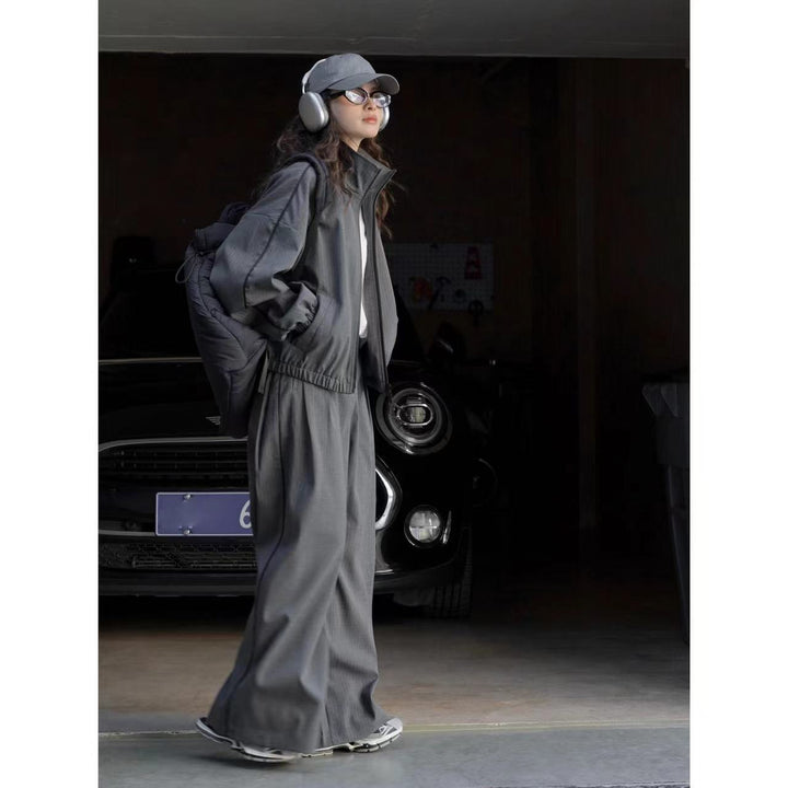 Women's loose pinstripe training jacket with stand-up collar, zipper and elastic hem Amarae