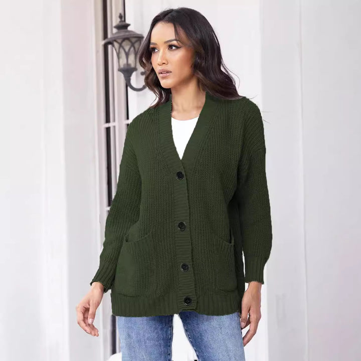 Ladies chunky knit cardigan with large pockets and modern button design Chic and Still