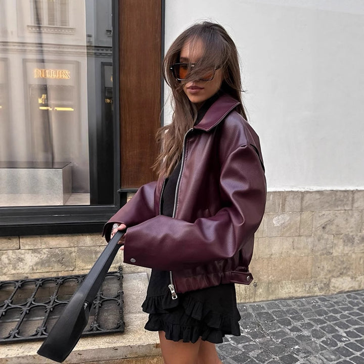 Women Short Oversized Faux Leather Flight Jacket with Distinctive Lapel and Snap Button Cuffs Amarae