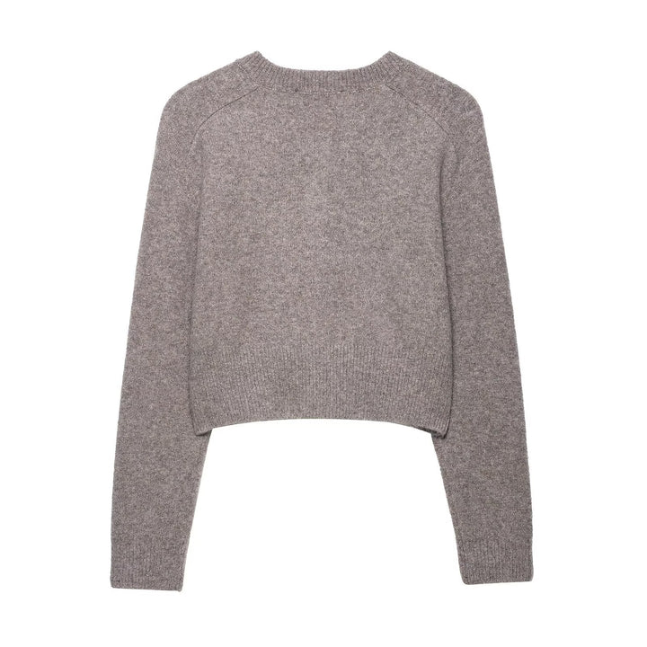 Short knitted jacket for ladies with button details Lune London