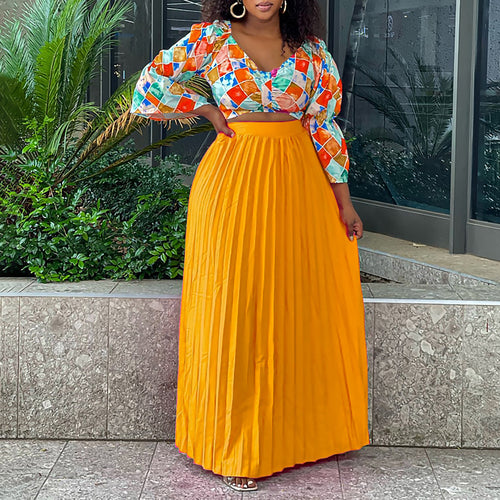 Pleated combined dress for ladies with a colorful top and a flared skirt Amarae