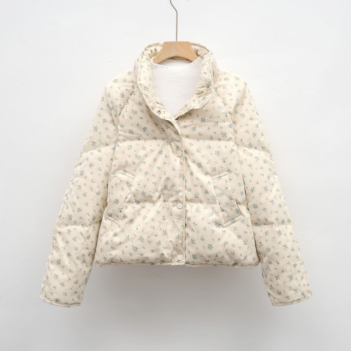 Veste matelassée volumineuse pour femmes avec un design floral et des poches pratiques Lune London