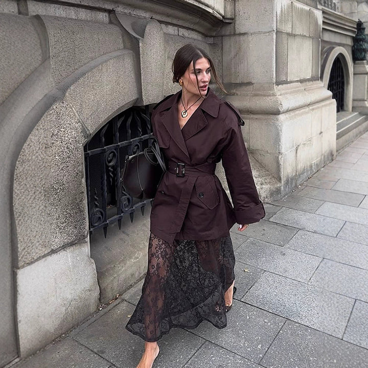 Women's short trench coat with oversized cut, waist belt and prominent shoulder patches Amarae
