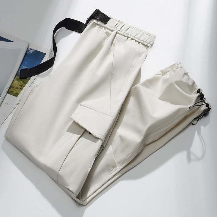Men's cargo joggers with elastic waistband, drawstring, adjustable leg cuffs, and patch pockets.