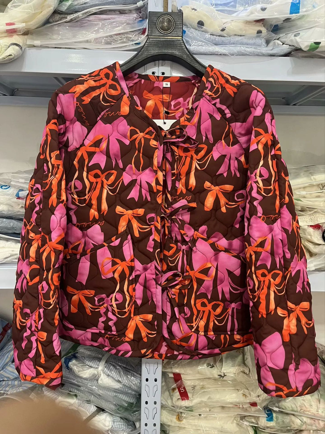 Quilted jacket for women with playful bow pattern Lune London