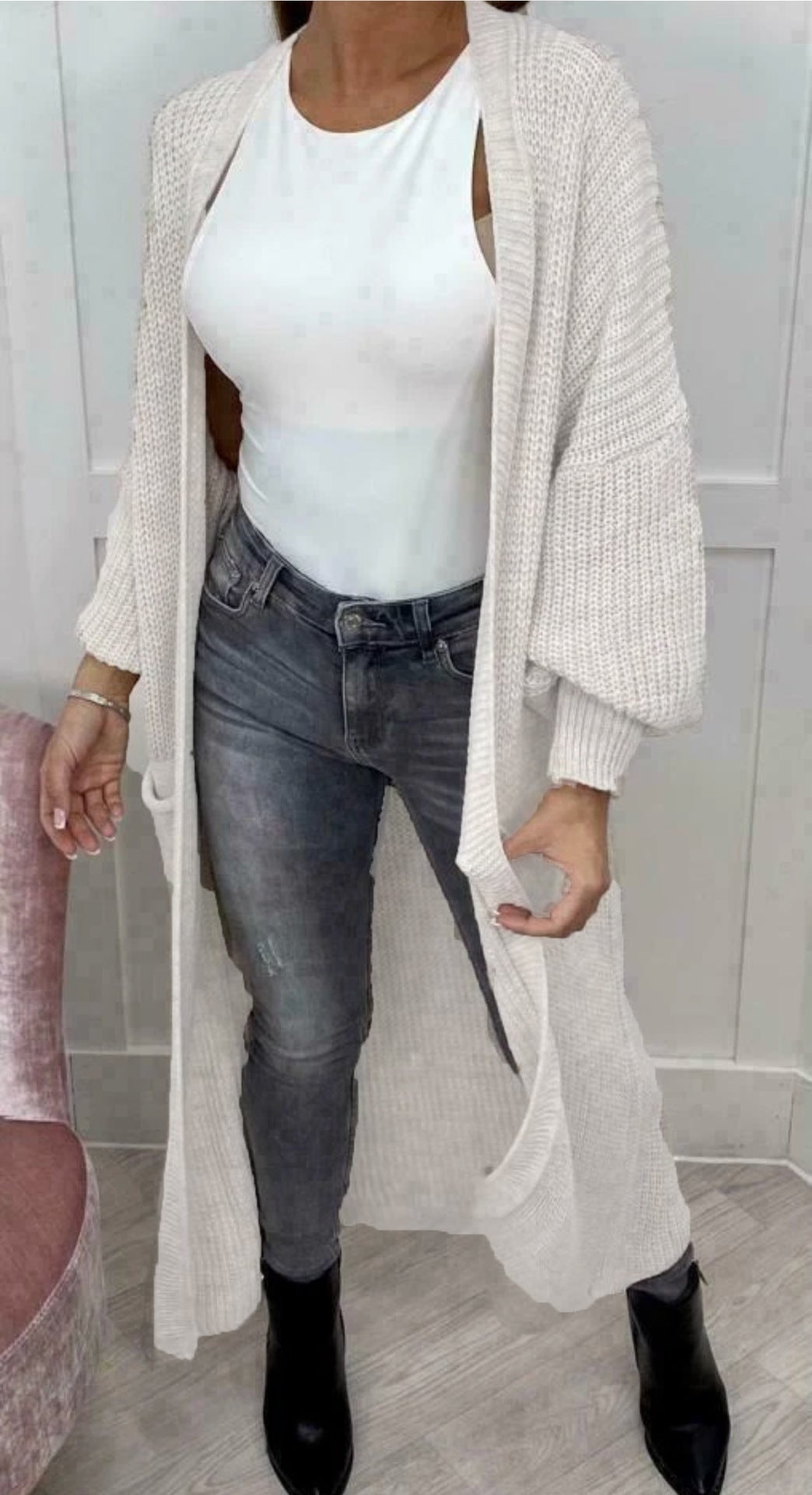 Ladies' knitted coat with deep pockets and modern details Lune London