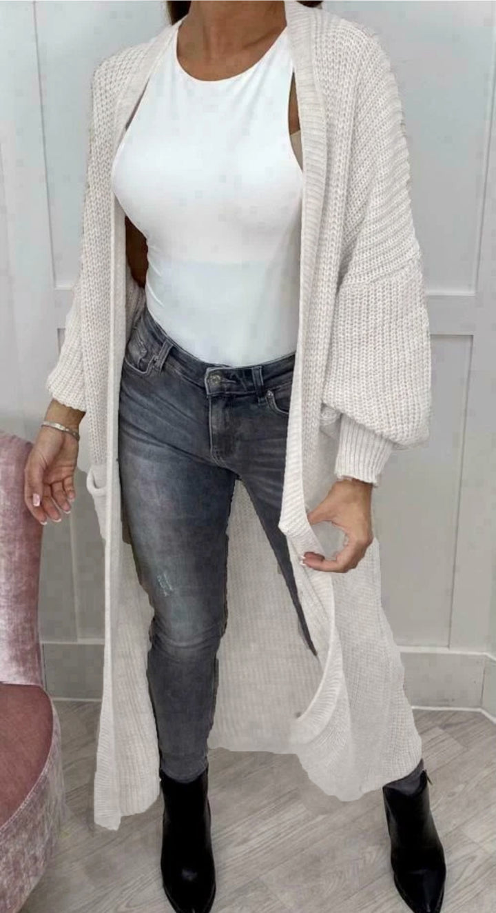 Ladies' knitted coat with deep pockets and modern details Lune London