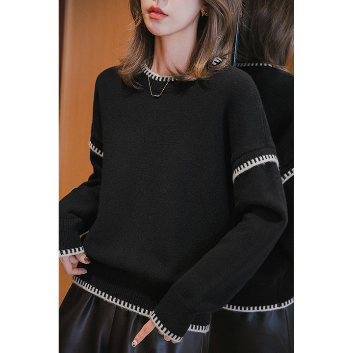 Pull confortable pour femme avec ourlet texturé et accents modernes Chic & Stil