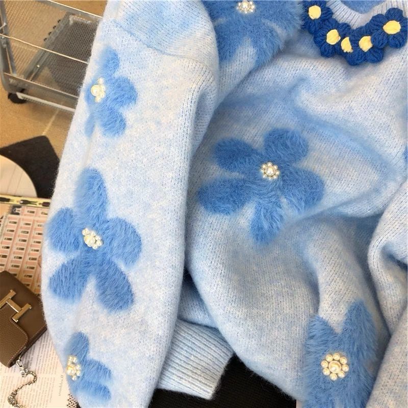 Pull en tricot pour femmes avec design floral et embellissements en perles Chic & Stil