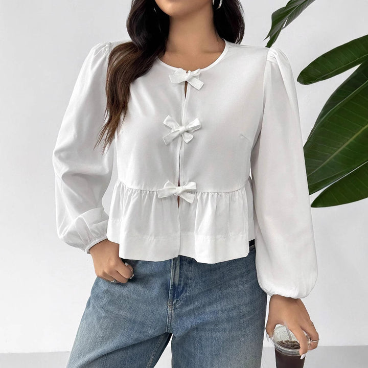 Women’s blouse with romantic ruffle details and a bow Lune London