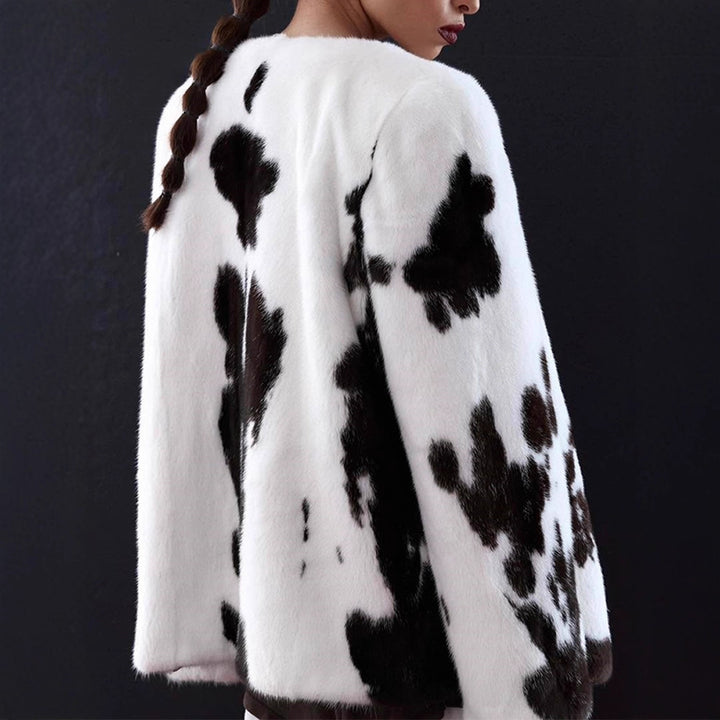 Women's short coat made of faux fur with boxy silhouette and cow print pattern Amarae