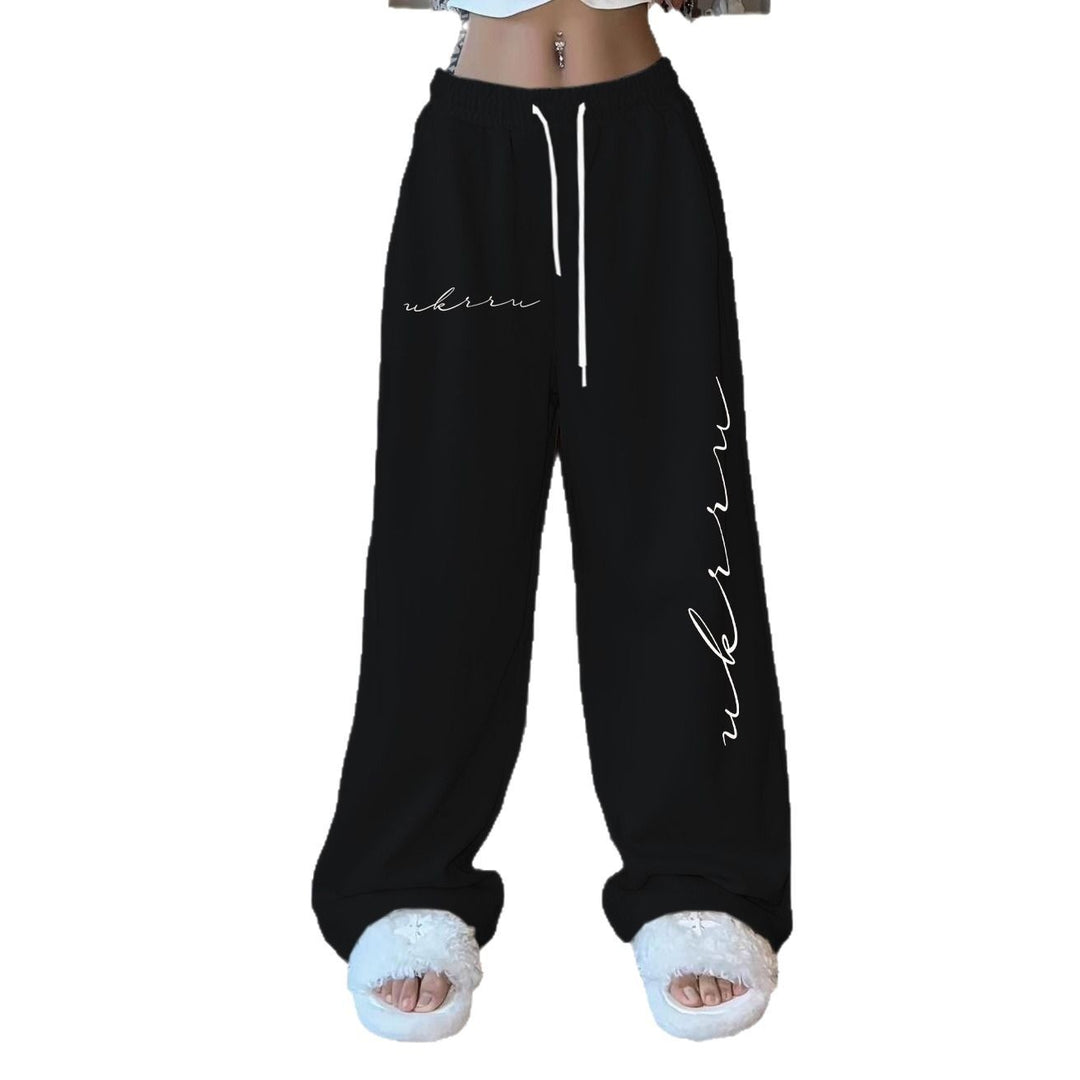 Women comfortable leisure trousers with elastic waistband and side print Chic & Stil