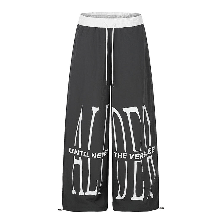 Women's wide loungewear pants with high comfort waistband, drawstring, adjustable hem, and typographic print Amarae