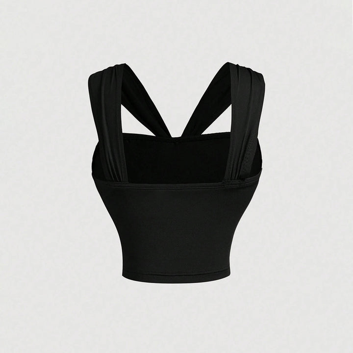Chic & Stil Sophisticated wrap design women's court top with decorative straps