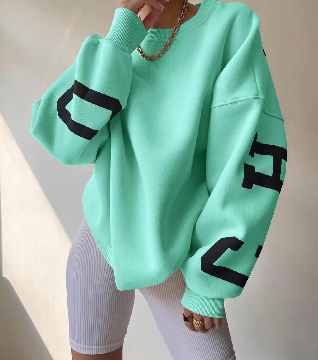 Ladies Oversized Sweatshirt with Chic Logo and Striking Style