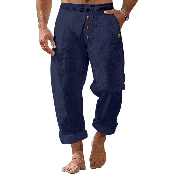 Casual beach pants for men with elastic waistband and practical button details Lune London