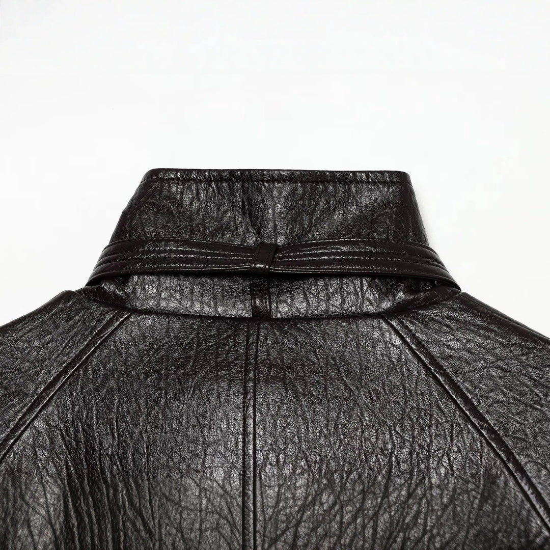 Women's short jacket made of faux leather with high buckle collar and waist belt Amarae