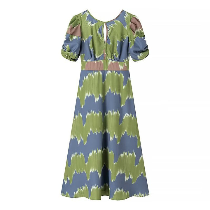 Maxi dress for ladies with elegant gather and modern puff sleeves Lune London