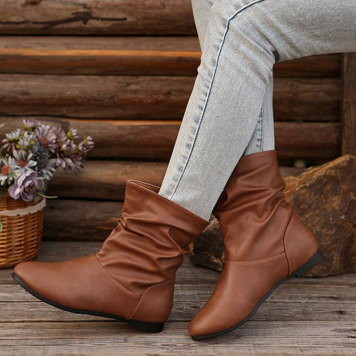 Fashionable women's ankle boots with an elegant ruffle design and a soft upper material Amarae