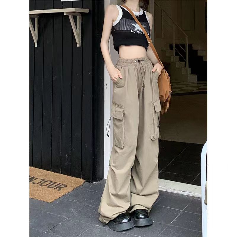 Women's cargo trousers with side pockets and elastic waistband Chic & Stil