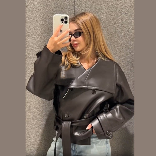 Fashionable short leather jacket for women with double-breasted buttoning and wide collar Amarae