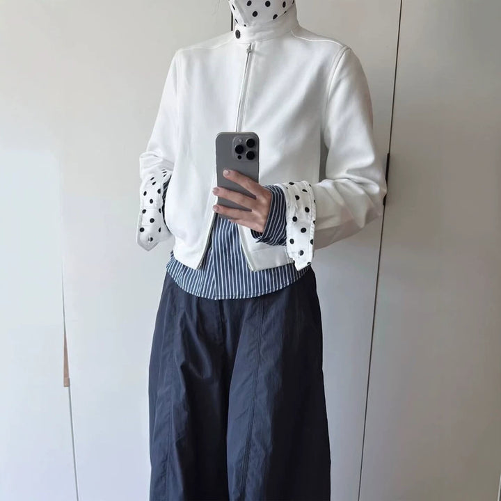 Women’s short-cut blouson jacket with stand-up collar, concealed zipper and contrasting polka dot patterned lining Amarae