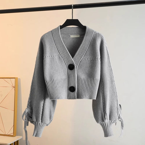 Cardigan court à la mode pour femmes avec des détails de boutons élégants et une texture côtelée unique Chic & Stil