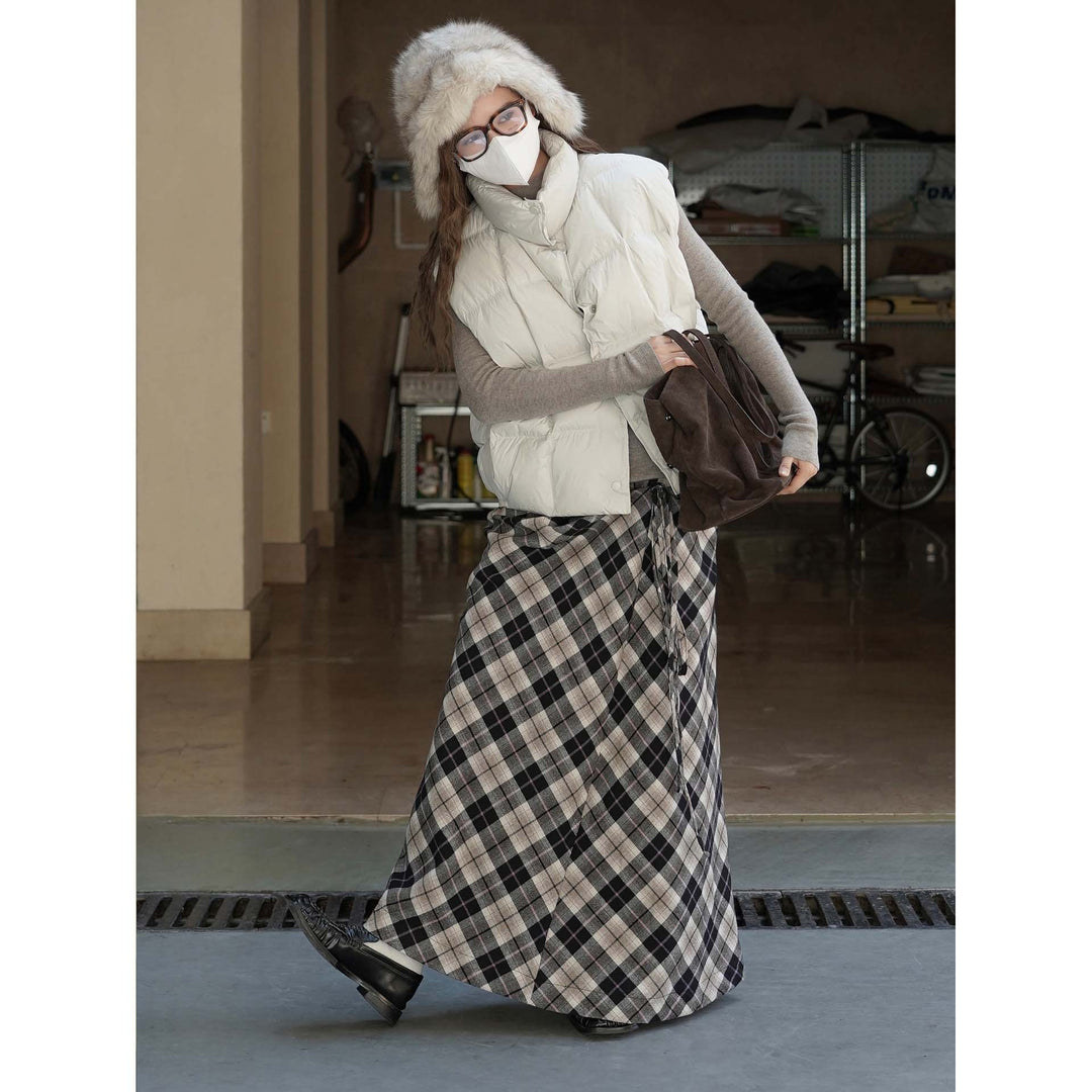 Women's lightweight quilted vest with high collar and snap button placket Amarae