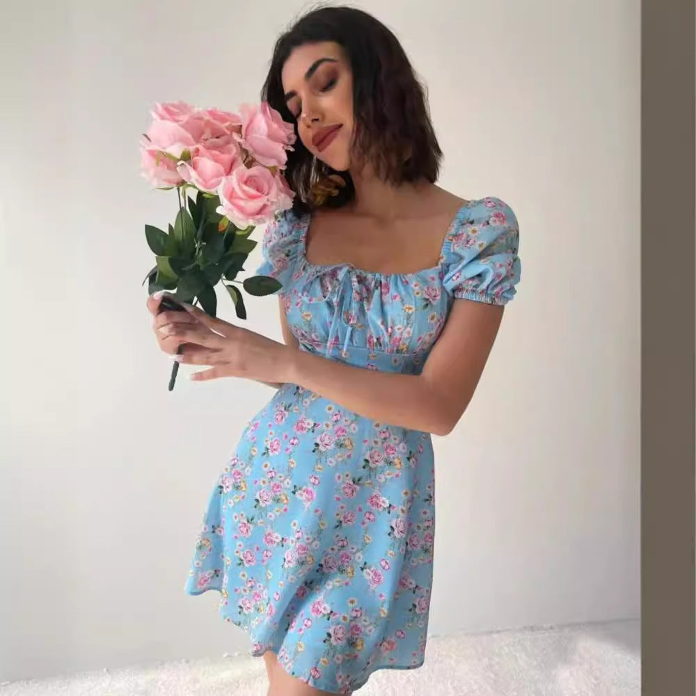 Ladies mini dress with voluminous puff sleeves and floral pattern Lune London