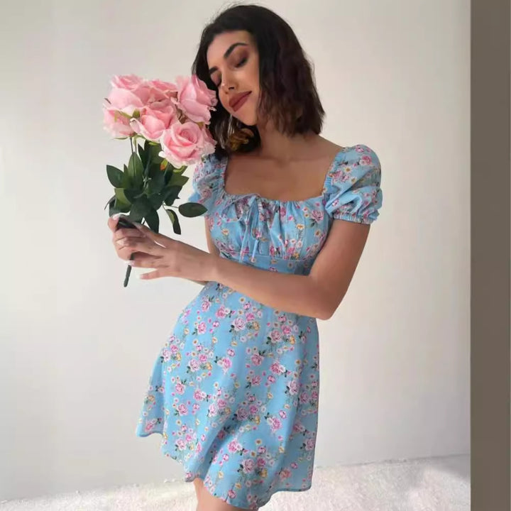Ladies mini dress with voluminous puff sleeves and floral pattern Lune London